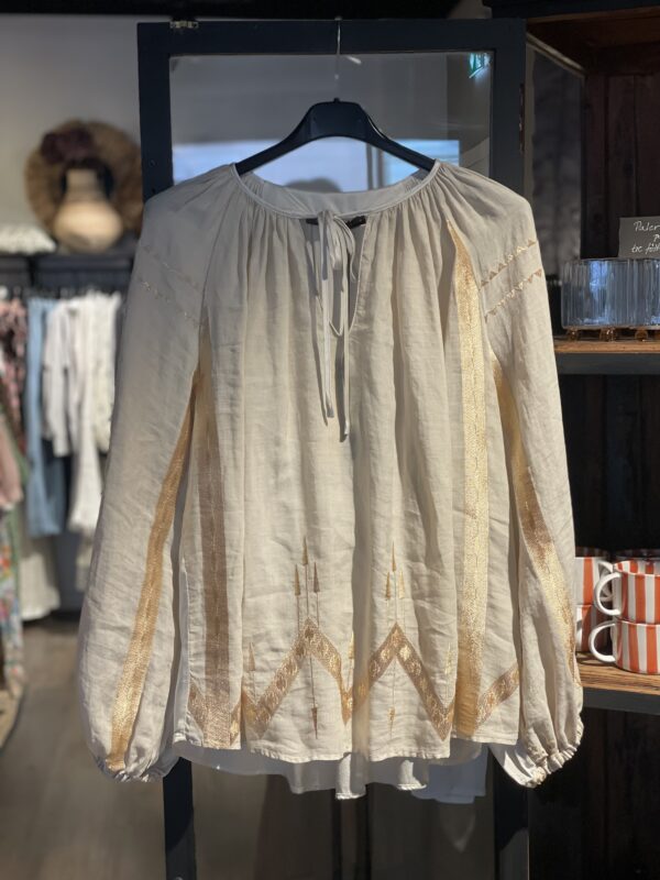 Kori blus arrow creme/gold