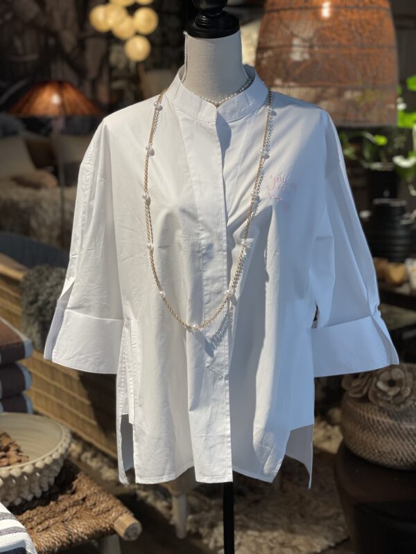 Vit magic blus med fickor i sidorna Wauw